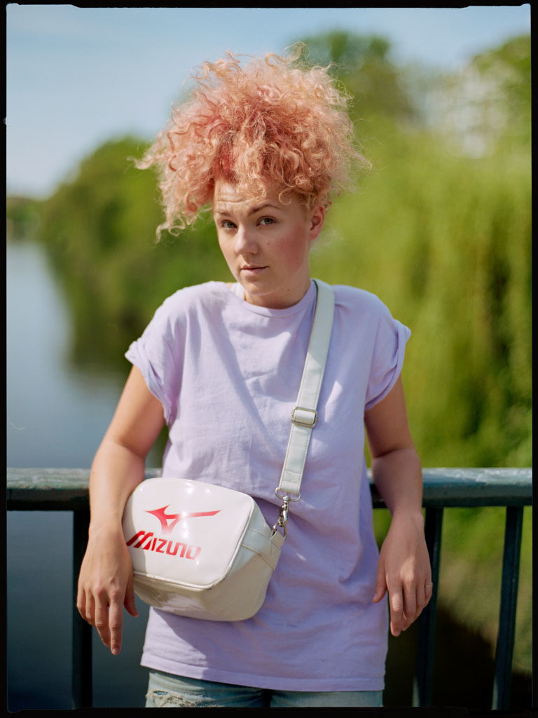 Gorgeous Strawberry Blonde Hair meets lavender t-shirt on the Hobrechtbrücke in Kreuzberg